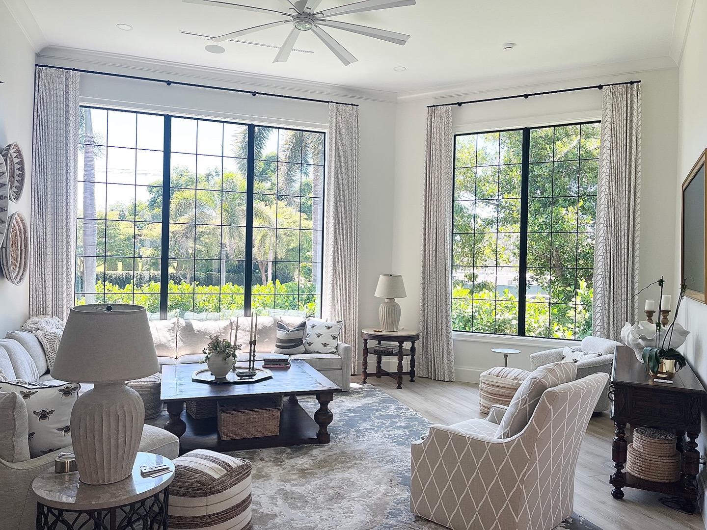 Installed MDH custom H-rail across two living-room windows with floor-length drapery
